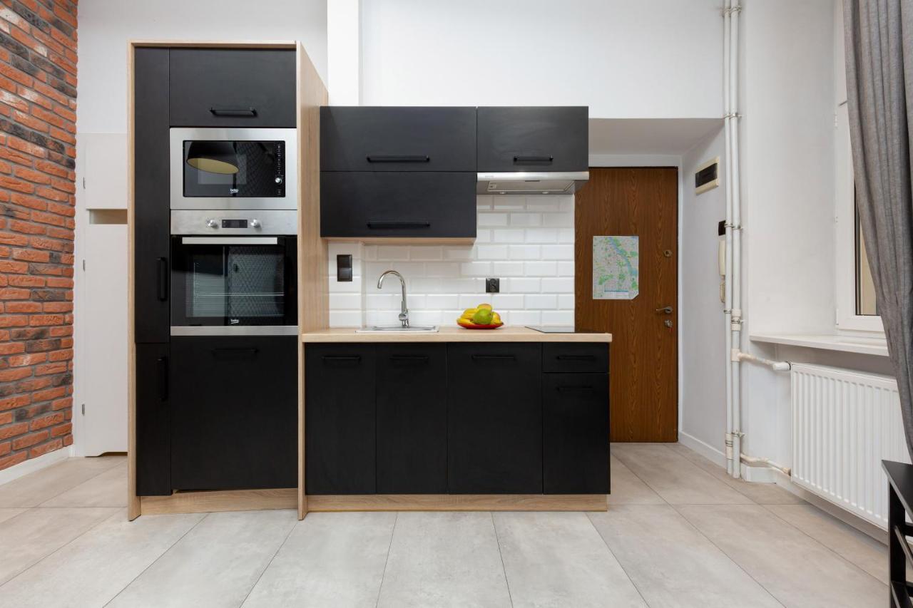 Downtown Studio Apartment Poznanska By Renters Varsavia Esterno foto